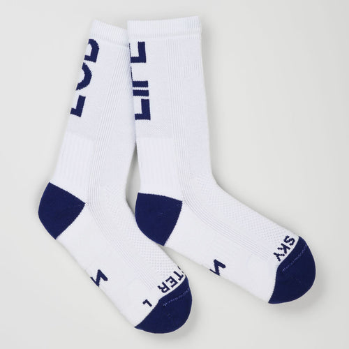 A pair of white padel socks with navy blue accents on the heels, toes, and soles, , with the padel statement 'LOB LIFE' printed in navy blue on the cuffs.